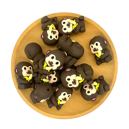 Silicone 3D Focal Beads Monkey Eating Banana Front Facing 2
