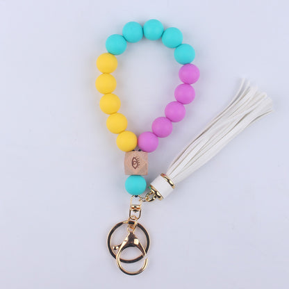 Beech Wood with Eyes Octagonal Tassels Silicone Bead Wristlet Keychain 17