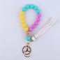 Beech Wood with Eyes Octagonal Tassels Silicone Bead Wristlet Keychain 17