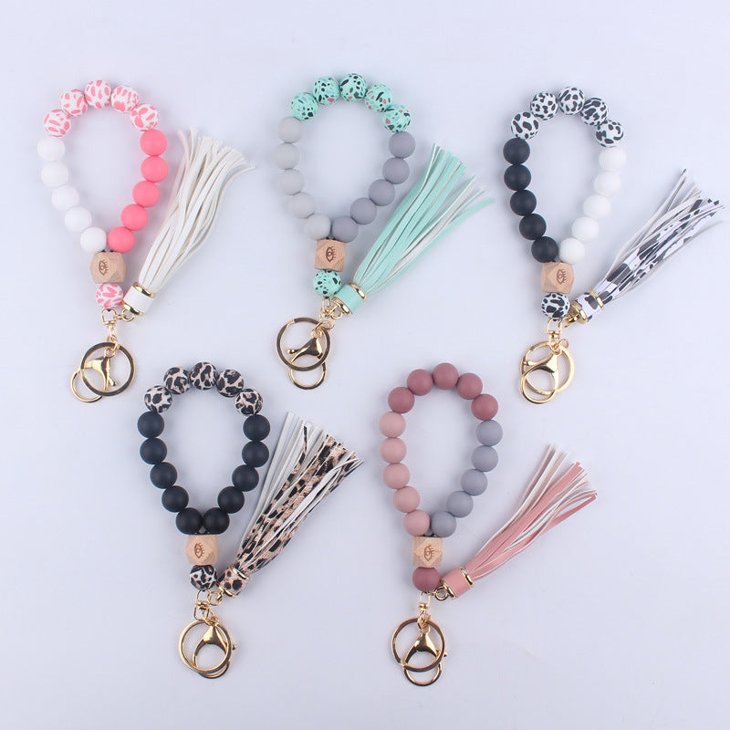Beech Wood with Eyes Octagonal Tassels Silicone Bead Wristlet Keychain