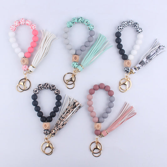 Beech Wood with Eyes Octagonal Tassels Silicone Bead Wristlet Keychain