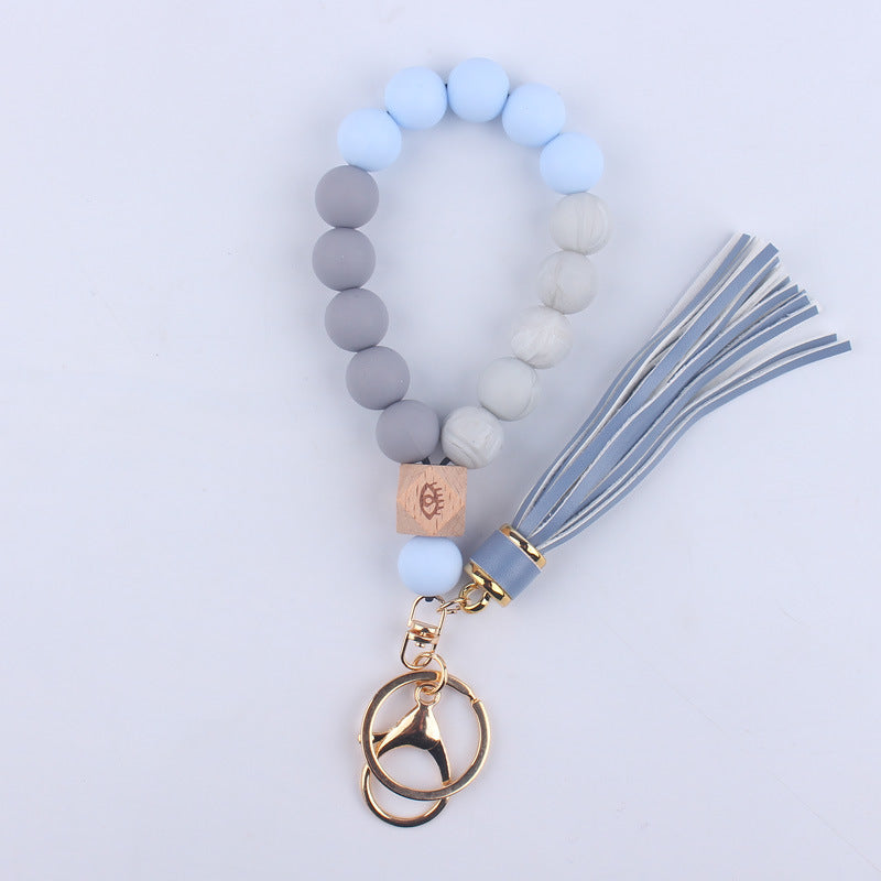 Beech Wood with Eyes Octagonal Tassels Silicone Bead Wristlet Keychain 13