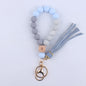 Beech Wood with Eyes Octagonal Tassels Silicone Bead Wristlet Keychain 13