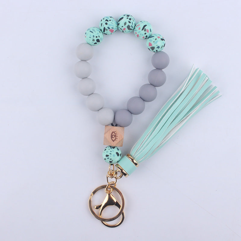 Beech Wood with Eyes Octagonal Tassels Silicone Bead Wristlet Keychain 9