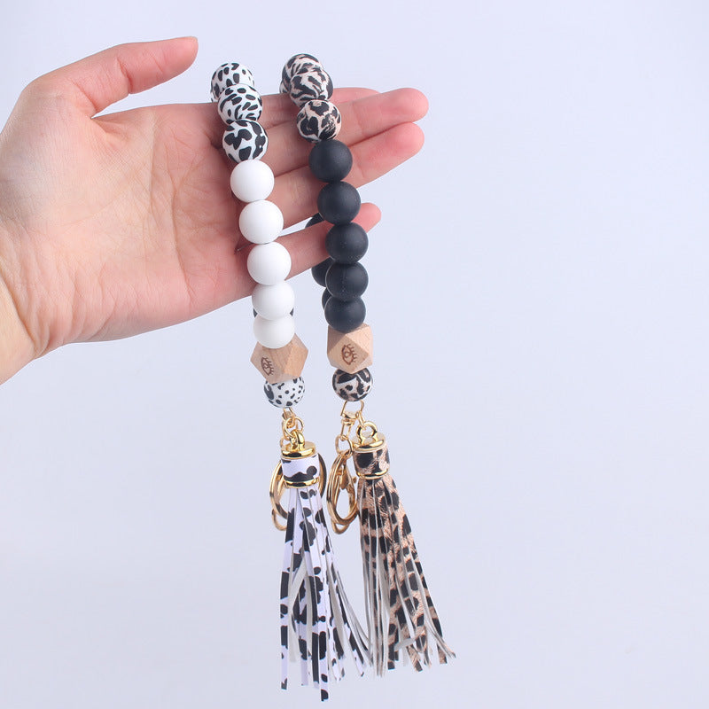 Beech Wood with Eyes Octagonal Tassels Silicone Bead Wristlet Keychain 3