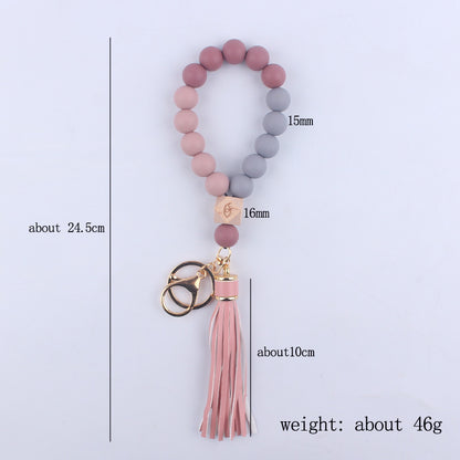 Beech Wood with Eyes Octagonal Tassels Silicone Bead Wristlet Keychain 5