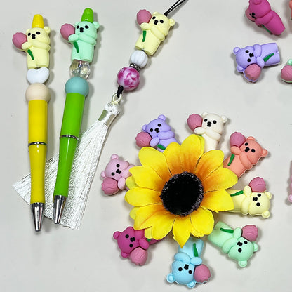 20Pcs Silicone 3D Focal Beads Colored Teddy Bear Holding Flower 2