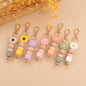 Daisy Silicone Bead Keychain with Wooden Round Bead Charm