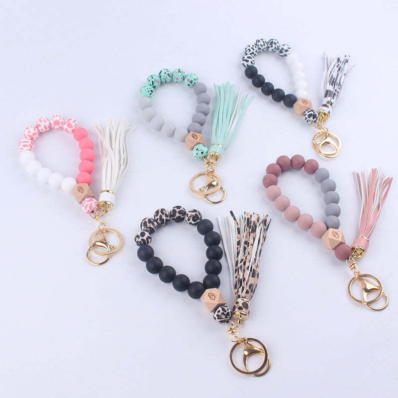 Beech Wood with Eyes Octagonal Tassels Silicone Bead Wristlet Keychain 2