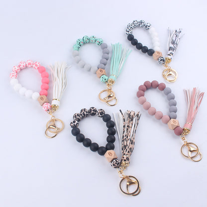 Beech Wood with Eyes Octagonal Tassels Silicone Bead Wristlet Keychain 2