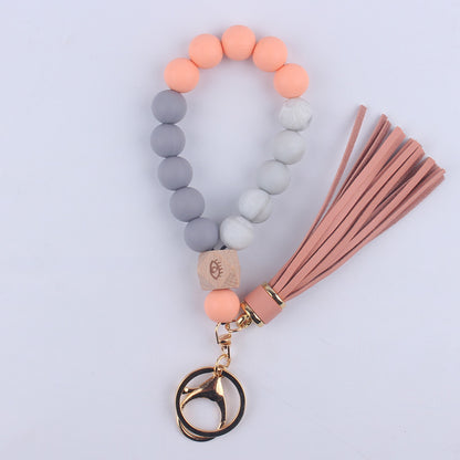 Beech Wood with Eyes Octagonal Tassels Silicone Bead Wristlet Keychain 12