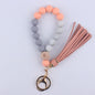 Beech Wood with Eyes Octagonal Tassels Silicone Bead Wristlet Keychain 12
