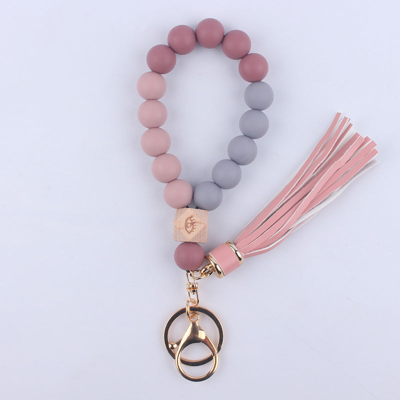 Beech Wood with Eyes Octagonal Tassels Silicone Bead Wristlet Keychain 16