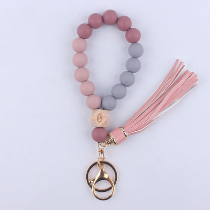Beech Wood with Eyes Octagonal Tassels Silicone Bead Wristlet Keychain 16