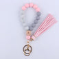 Beech Wood with Eyes Octagonal Tassels Silicone Bead Wristlet Keychain 10